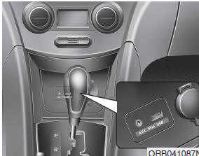 Hyundai Accent: Aux, USB and iPod port. If your vehicle has an aux and/or USB(universal serial bus) port or iPod port,
