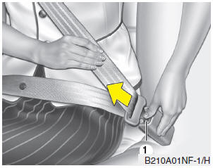 Hyundai Accent: Seat belt restraint system. To release the seat belt: