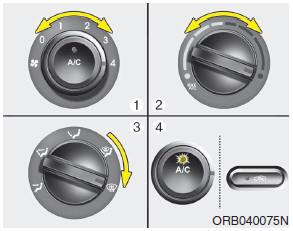 Hyundai Accent: Manual climate control system. To defog inside windshield