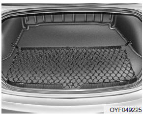 Hyundai Accent: Luggage net (holder). To keep items from shifting in the cargo area, you can use the holders located