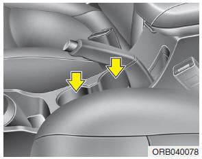 Hyundai Accent: Cup holder. Cups or small beverage cans may be placed in the cup holders.