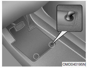 Hyundai Accent: Floor mat anchor. When using a floor mat on the front floor carpet, make sure it attaches to the