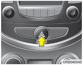 Hyundai Accent: Hazard warning flasher. The hazard warning flasher serves as a warning to other drivers to exercise extreme