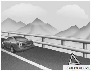 Hyundai Accent: Changing tires. 1. Park on a level surface and apply the parking brake firmly.