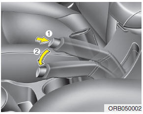 Hyundai Accent: Parking brake. Releasing the parking brake