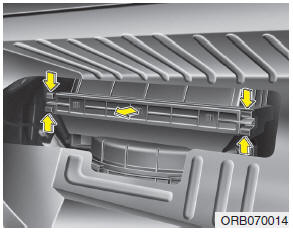 Hyundai Accent: Filter replacement. 3. Remove the climate control air filter cover while pressing the lock of the